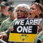 FILE PHOTO: Members of UMWA and other labor leaders picket outside BlackRock’s Headquarters in New York