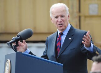 Forgetful Joe Looks Confused As He Struggles To Exit Stage At Rally