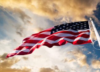 High School Swimmer Disqualified From Race Over American Flag On Cap